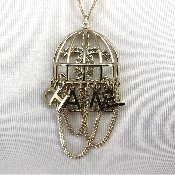 CHANEL Jewelry - Chanel Metal Gold Crystal Logo Bird Cage Necklace